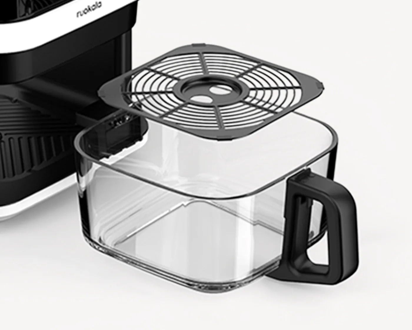 Ruokala air fryer with a transparent detachable basket showcasing the versatility and ease of use.