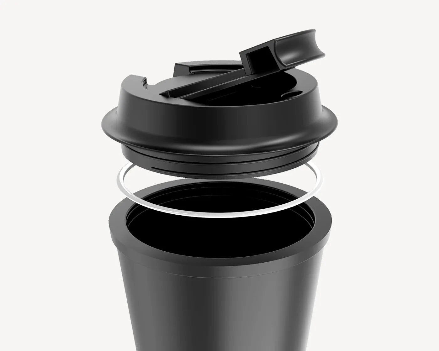 Innovative design of a matte black travel mug with open lid showcasing spill-proof feature.